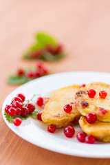 Pancakes with red currants