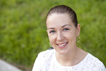 Happy young woman. Outdoor portrait