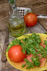 tomato and bottle with vegetable oil