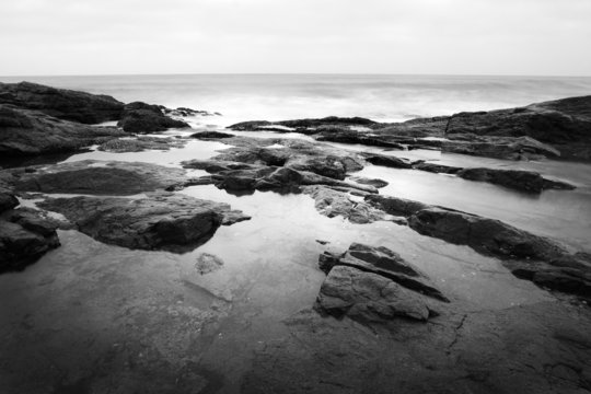 Fototapeta Black and white image of a dramatic ocean scene