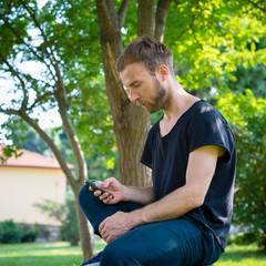 hipster modern stylish blonde man with phone