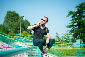 hipster modern stylish blonde man listening music