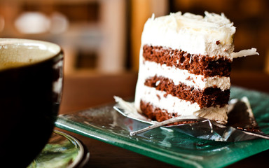 Chocolate cake with a cup of coffee