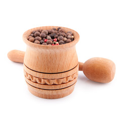 Peppercorn in a wooden bowl