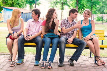 Obraz premium Group of happy smiling Teenage Students Outside