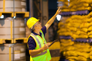 shipping company worker counting pallets