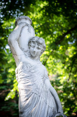 Fototapeta premium Woman with amphora statue