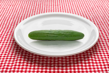 Fresh cucumber on plate