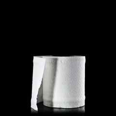 toilet paper isolated on black background