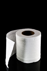 toilet paper isolated on black background