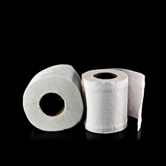 toilet paper isolated on black background