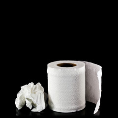toilet paper isolated on black background