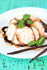 Panna Cotta with chocolate  and caramel sauce and vanilla