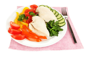 Boiled chicken breast on plate with vegetables isolated on
