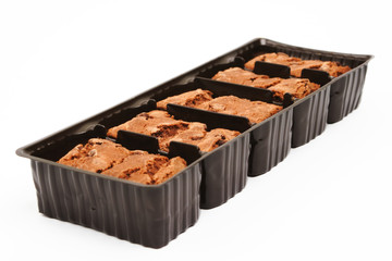 Brownies in a package on white