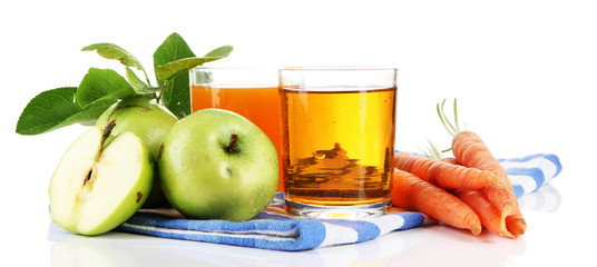 Glasses of juice, apples and carrots, isolated on white