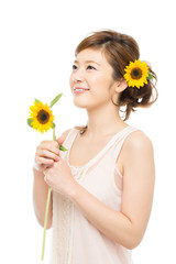 Beautiful asian woman with sumflower