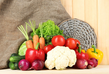 Fresh vegetables on wooden table close up