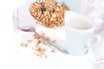 muesli cereal with dried fruits and milk