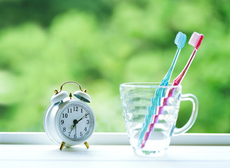 toothbrush and alarm clock