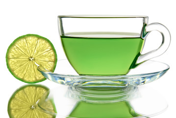 Green tea with lemon on a white background.