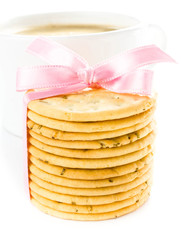 Sweet cookies tied with pink ribbon isolated on white background