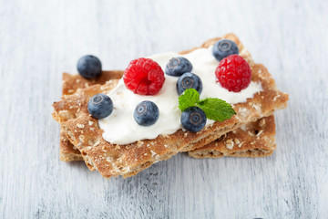 crisp bread with creme fraiche and berries