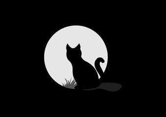 Silhouette of a cat on a background of the full moon