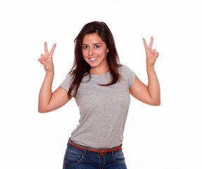 Gorgeous woman showing victory sign with fingers