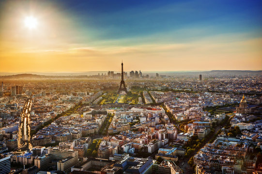 Paris, France at sunset. Aerial view on Eiffel tower, landmarks