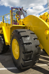 yellow road building powerful wheeler