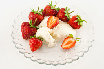 Strawberries and cream isolated on the white background