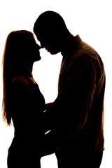 silhouette couple noses touching