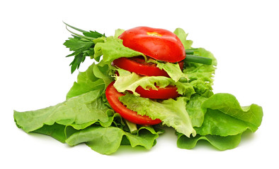 tomato vegetable and lettuce salad isolated on white background