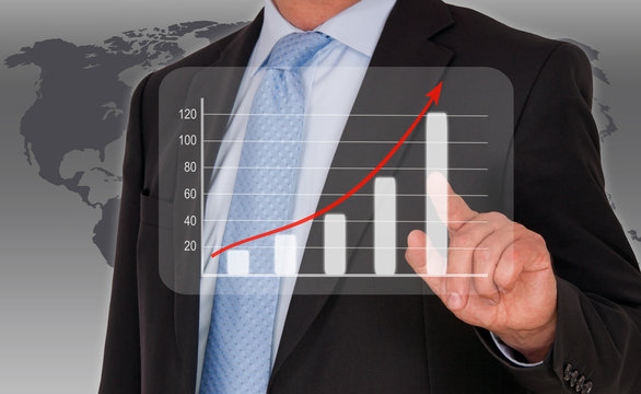 Man with performance uptake chart touchscreen