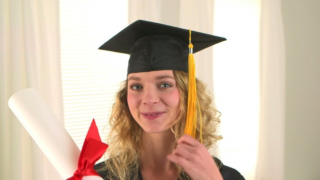 Happy blonde woman graduate