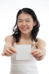 asian woman holding empty white card, focus at card