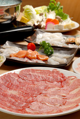 Fresh Beef, pork slices and seafood for Shabushabu and Sukiyaki