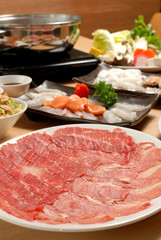 Fresh Beef, pork slices and seafood for Shabushabu and Sukiyaki