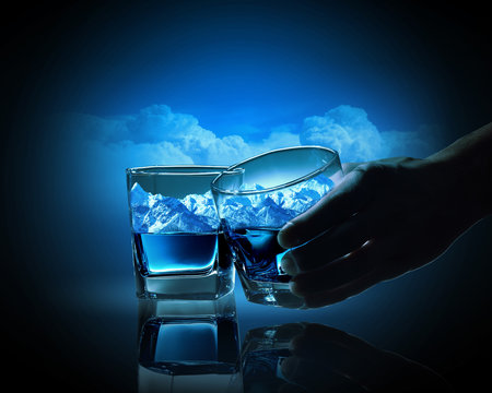 Two glasses of blue liquid