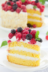 Sponge cake with cream and raspberries.