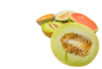 Various type of melons cut in half over white background