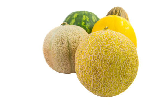 Various types of melons over white background.