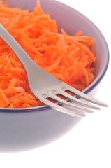 Carottes râpées et fourchette