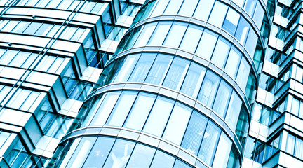  wide angle view to steel blue background of glass high building