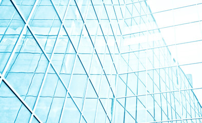  wide angle view to steel blue background of glass high building