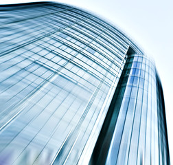 Fototapeta na wymiar Contemporary blue glass office building exterior