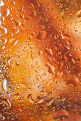 Fresh background of water drops on colorful surface