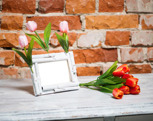 photo frame with bouquet of tulips