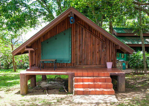 Wooden house or hut  in garden